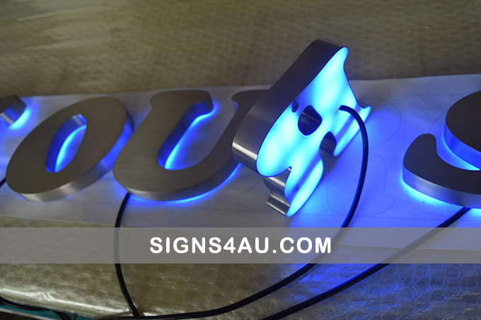 brushed-stainless-steel-backlit-signs-with-acrylic-back-plane
